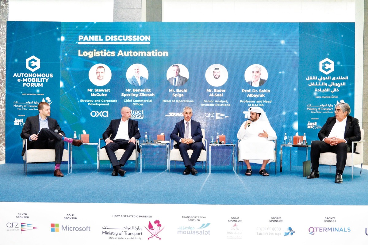 Senior Analyst, Investor Relations at QFZ, Bader Al Saai (second right), along with other officials during the panel discussion.