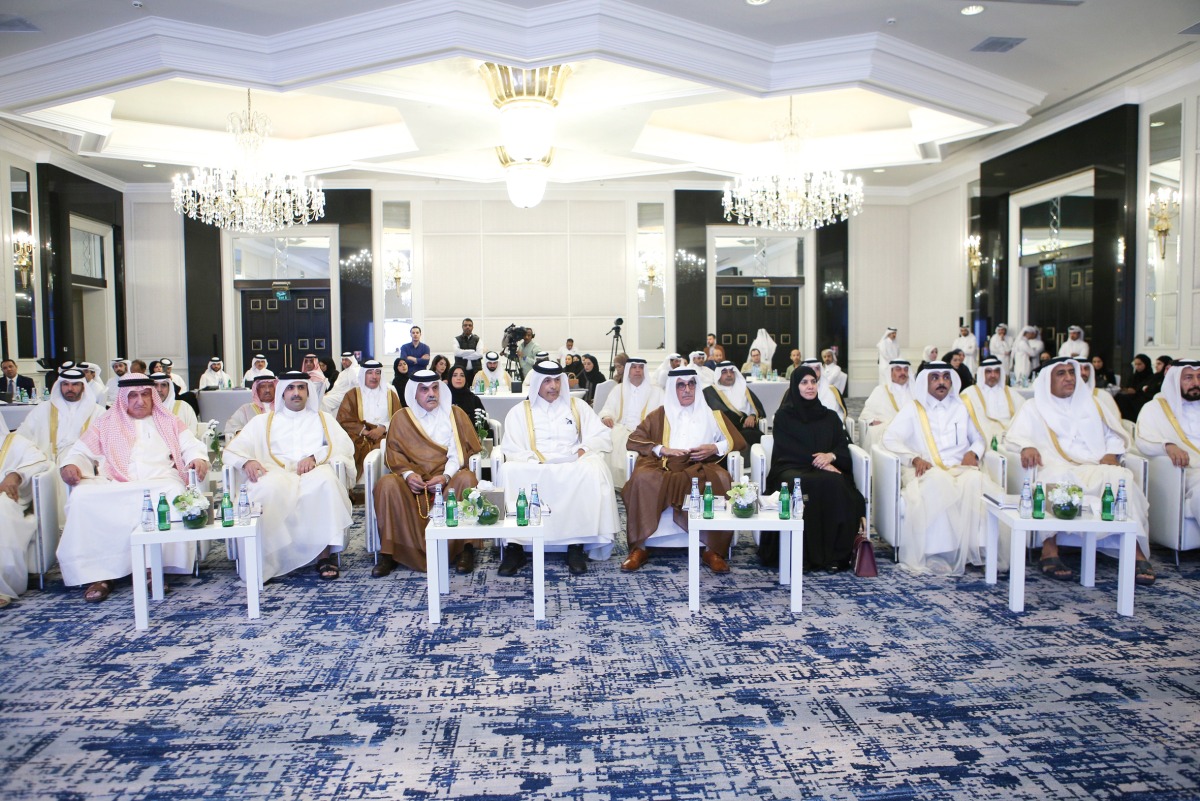 Speaker of the Shura Council H E Hassan bin Abdulla Al Ghanim (fourth left); Deputy Speaker of the Shura Council H E Dr. Hamda bint Hassan Al Sulaiti (sixth left); Minister of Culture H E Sheikh Abdulrahman bin Hamad Al Thani (second left); Minister of State and QNL President, H E Dr. Hamad bin Abdulaziz Al Kawari (fifth left); and other officials during the seminar in Doha yesterday.