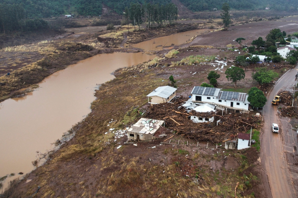 Aerial view after the floods caused by heavy rains in Mucum, Rio Grande do Sul state, Brazil, taken on May 10, 2024. (Photo by Gustavo Ghisleni / AFP)
 