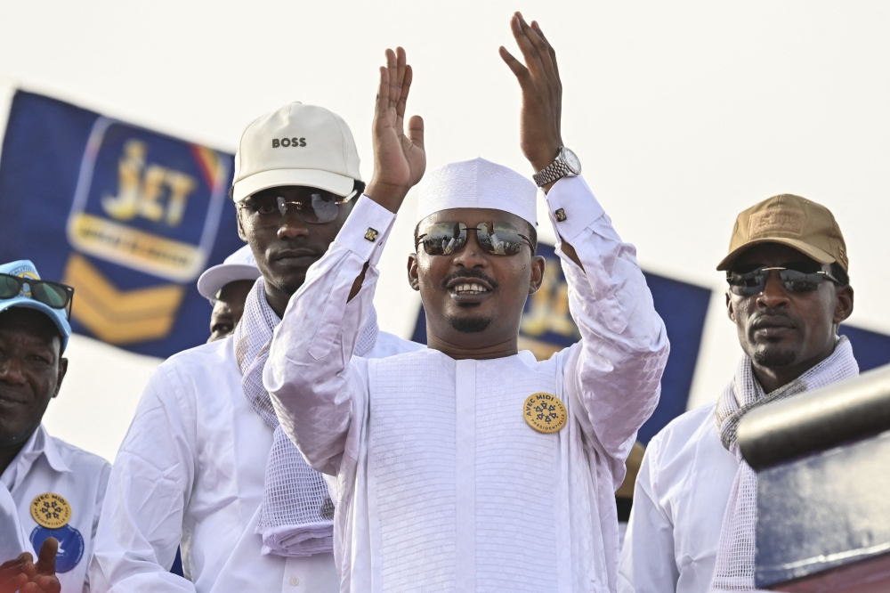 File: Chad's transitional president and presidential election candidate Mahamat Idriss Deby Itno acknowledges the crowd at the Place des Nations during final presidential election campaign rally in N'Djamena on May 4, 2024. (Photo by Issouf Sanogo / AFP)