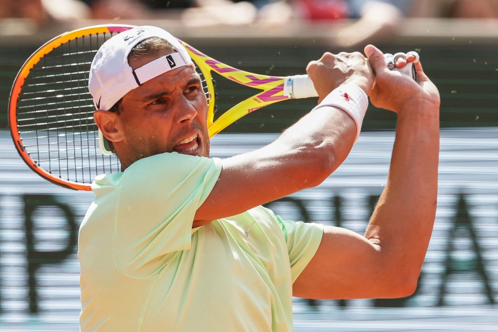 Spain's Rafael Nadal takes part in a practice session during the French Open tennis tournament on Court Philippe-Chatrier at the Roland Garros Complex in Paris on May 25, 2024. (Photo by ALAIN JOCARD / AFP)