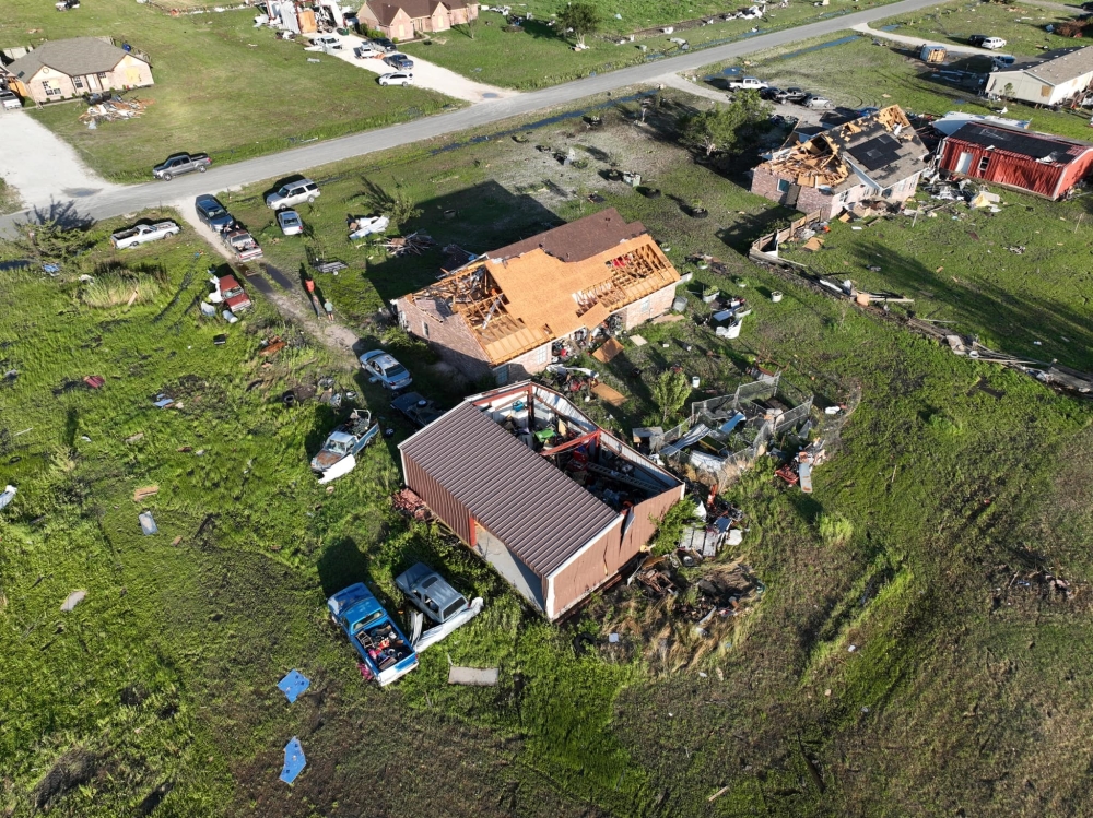 This handout photo taken on May 26, 2024, courtesy of Jacob Chambers shows an aerial view of widespread damage from a tornado in Valley View, Texas. Photo by Jacob CHAMBERS / HANDOUT / AFP.
