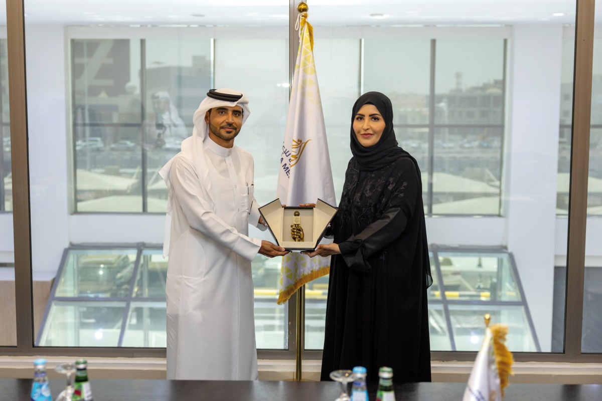 Yousuf Abdulla Fakhroo, Chief Marketing and Corporate Communications Officer, QFC and Eman Al Amri, Director of Al Jazeera Media Institute, during the signing ceremony.