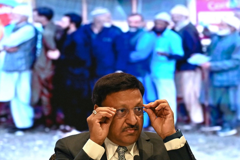Chief Election Commissioner of India, Rajiv Kumar gestures as he speaks during a news conference in New Delhi on June 3, 2024. (Photo by Money Sharma / AFP)