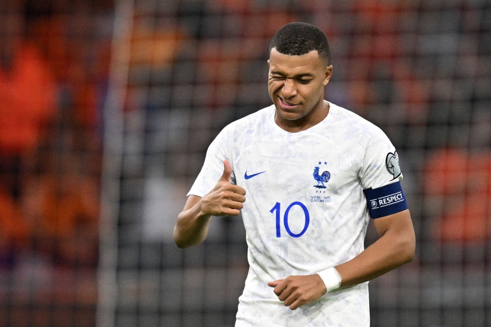 France's forward Kylian Mbappe reacts during the Euro 2024 qualifying football match between the Netherlands and France at the Johan Cruijff ArenA in Amsterdam on October 13, 2023. Photo by JOHN THYS / AFP