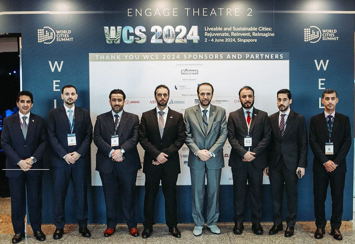 Minister of Municipality H E Abdullah bin Hamad bin Abdullah Al Attiyah (fourth left) with other officials at the event in Singapore.