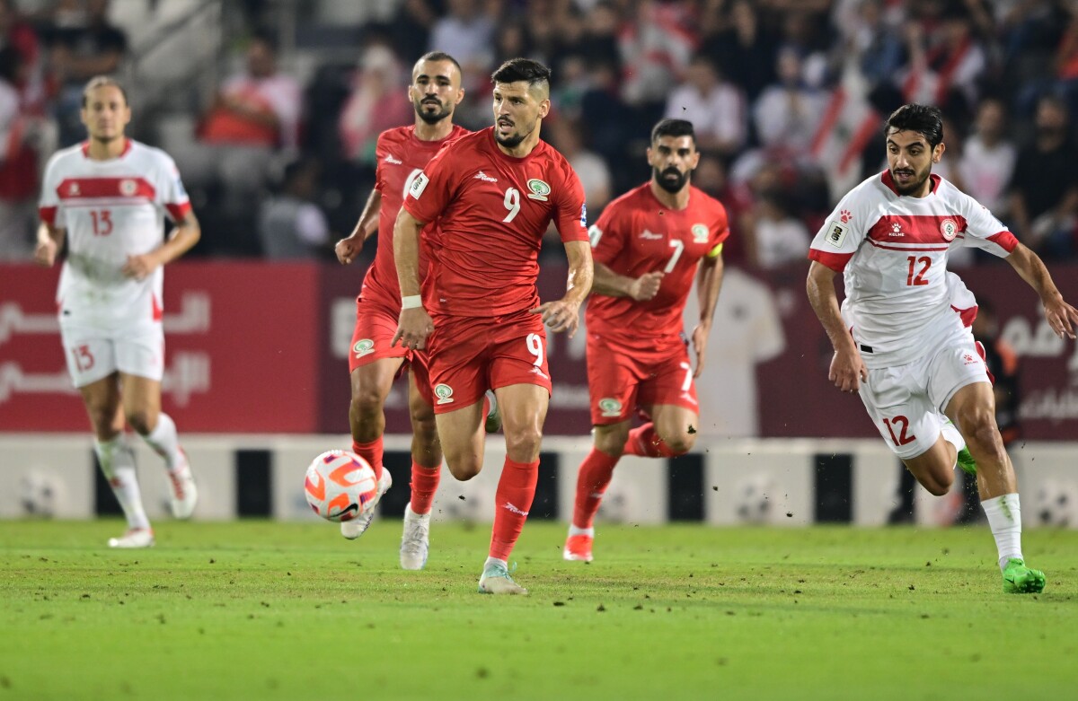 Palestine Tamer Seyam (second left) and Lebanon's Hasan Srour in action.