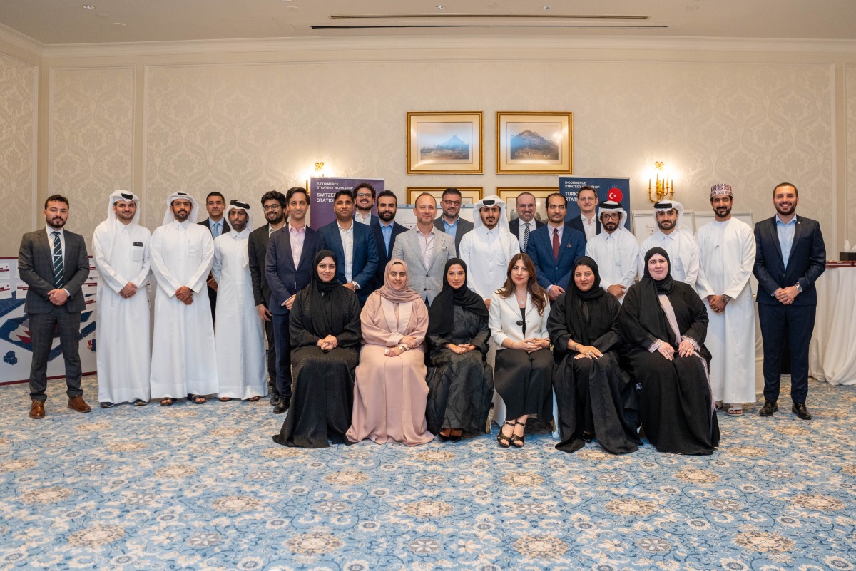 Officials pose for group photo during the workshop.