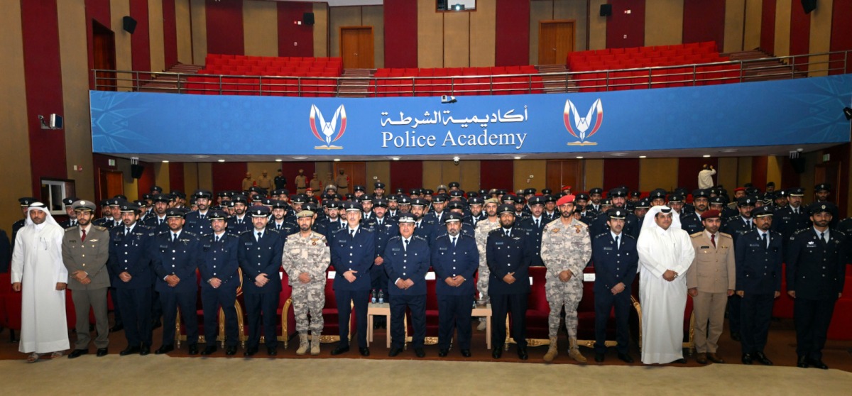 Officials and the graduates at the ceremony.