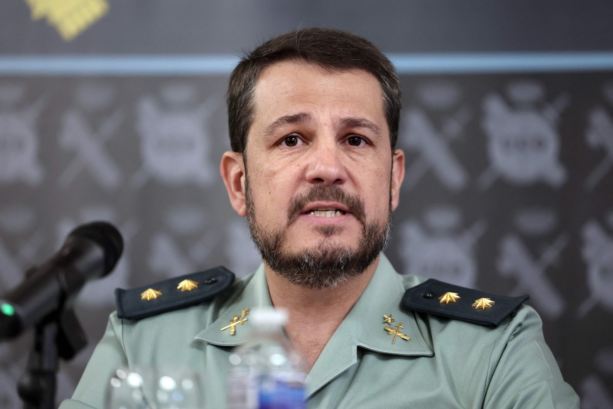 Spain's Civil Guard Lieutenant Colonel Oscar Esteban Remacha (head of the department against drug trafficking and money laundering) attends a press conference on an international anti drug operation, in Madrid, on June 13, 2024.(Photo by Thomas COEX / AFP)
