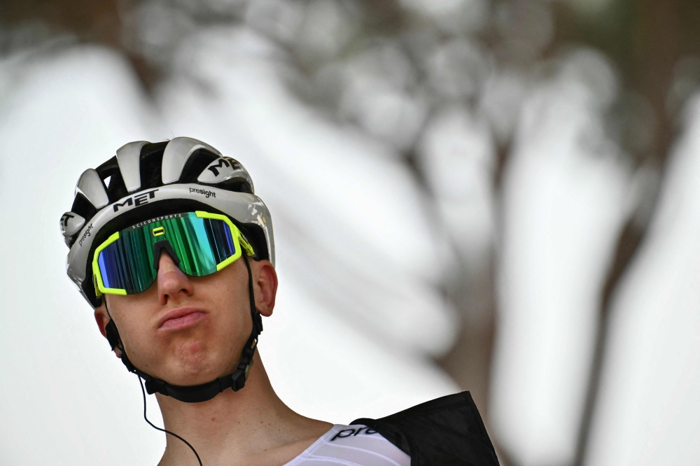 UAE Team Emirates team's Slovenian rider Tadej Pogacar awaits the start of the 1st stage of the 111th edition of the Tour de France cycling race, 206 km between Florence and Rimini, in Italy, on June 29, 2024. (Photo by Marco Bertorello / AFP)