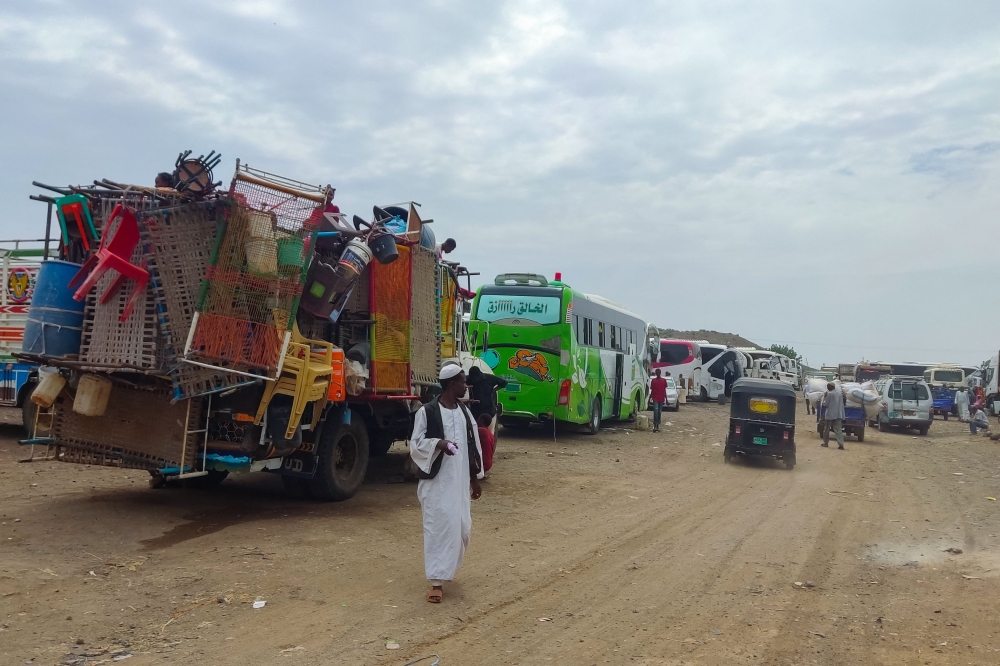 People fleeing the town of Singa, the capital of Sudan's southeastern Sennar state, arrive in Gedaref in the east of the war-torn country on July 1, 2024. (Photo by AFP)
