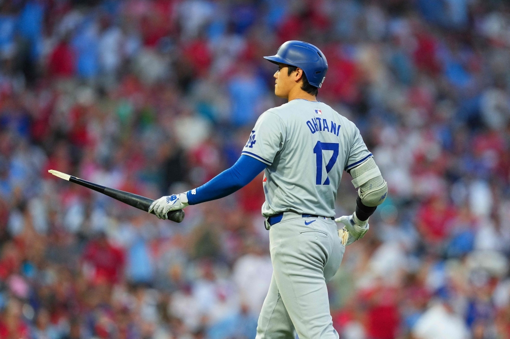 Shohei Ohtani #17 of the Los Angeles Dodgers breaks his bat on a ground out in the top of the seventh inning against the Philadelphia Phillies at Citizens Bank Park on July 11, 2024 in Philadelphia, Pennsylvania. Photo by Mitchell Leff / GETTY IMAGES NORTH AMERICA / Getty Images via AFP)