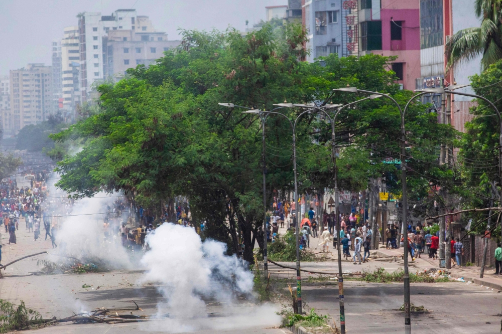 Anti-quota protesters clash with the police in Dhaka on July 19, 2024. (Photo by Abdul Goni / AFP)