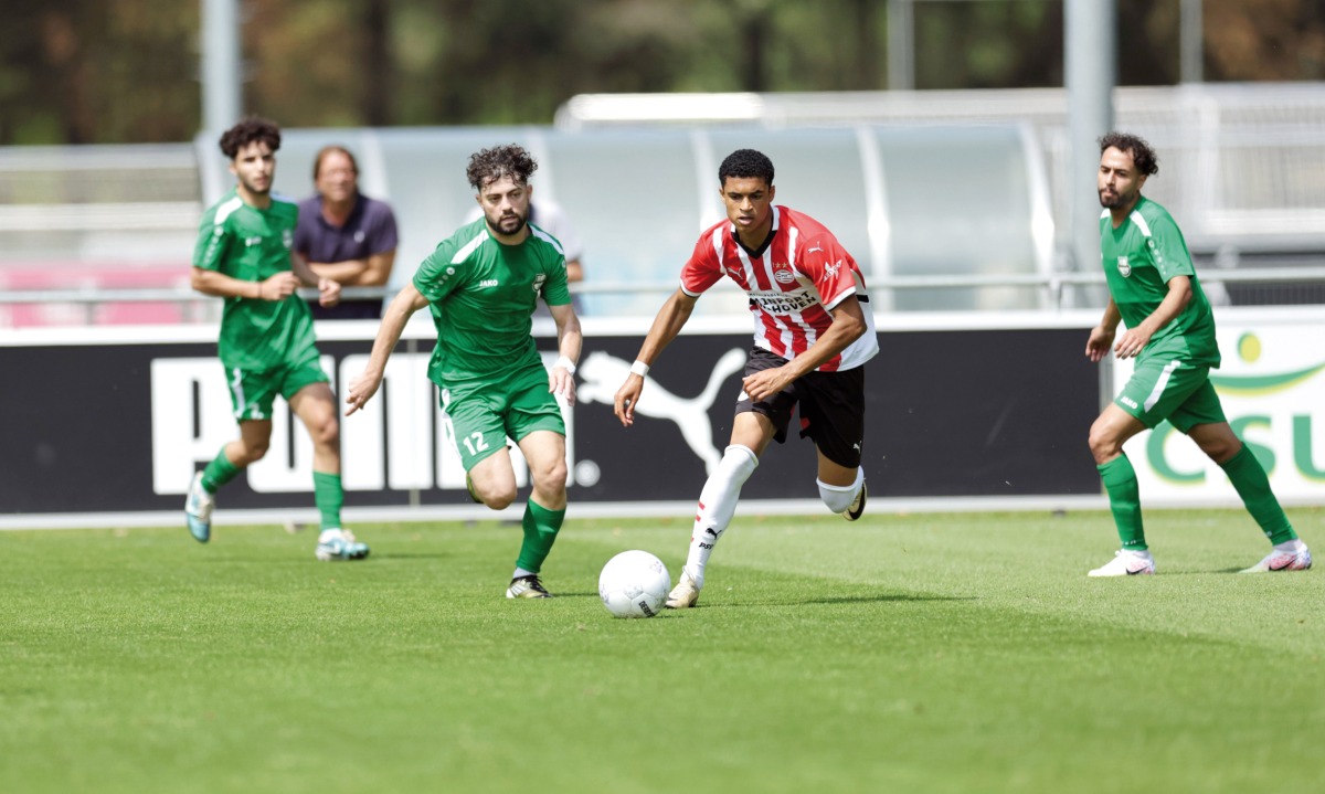Al Ahli and PSV Eindhoven U-23 players in action.