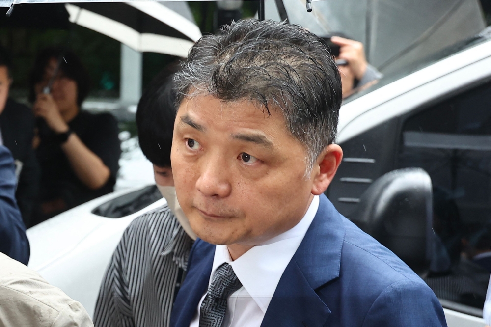 Kim Beom-su, founder of South Korean internet company Kakao, arrives at a court in Seoul on July 22, 2024. Photo by YONHAP / AFP