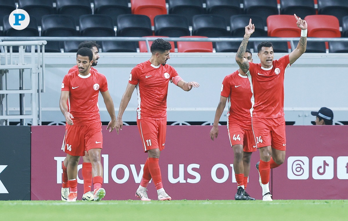 Al Shamal’s Baghdad Bounedjah (centre) celebrates with teammates after scoring a goal against Al Sadd. PIC: Rajan Vadakkemuriyil / The Peninsula 