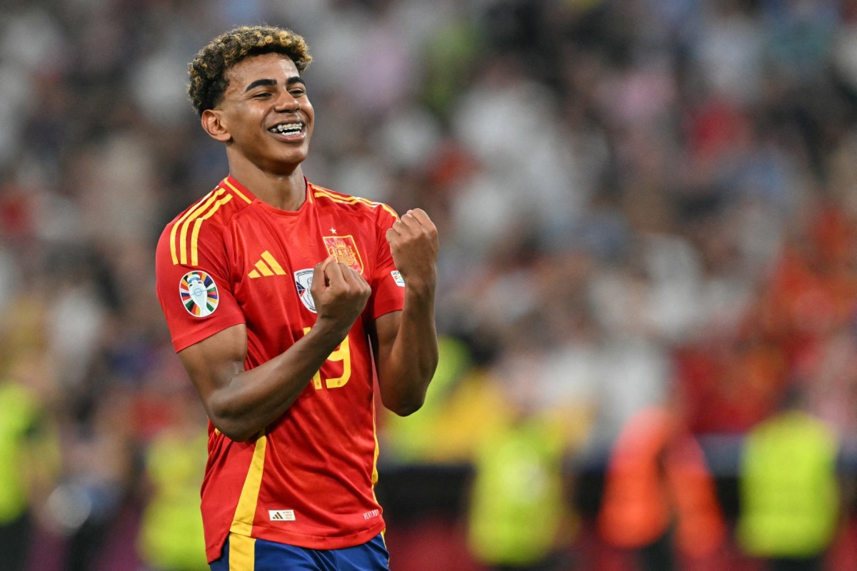 (FILES) Spain's forward Lamine Yamal celebrates at the end of the UEFA Euro 2024 semi-final football match between Spain and France at the Munich Football Arena in Munich on July 9, 2024. (Photo by MIGUEL MEDINA / AFP)