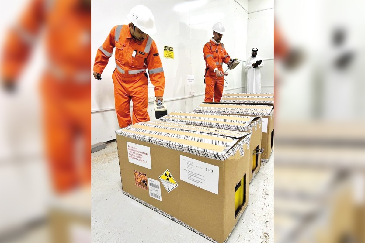 Workers inspecting some radioactive materials recently.