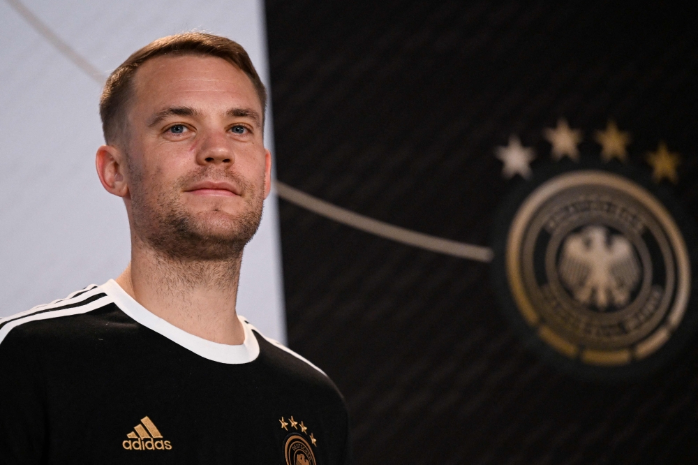 (FILES) Germany's goalkeeper Manuel Neuer attends a press conference at Al Shamal Stadium in Al Shamal, north of Doha, on November 19, 2022, ahead of the Qatar 2022 World Cup football tournament. (Photo by Ina FASSBENDER / AFP)
