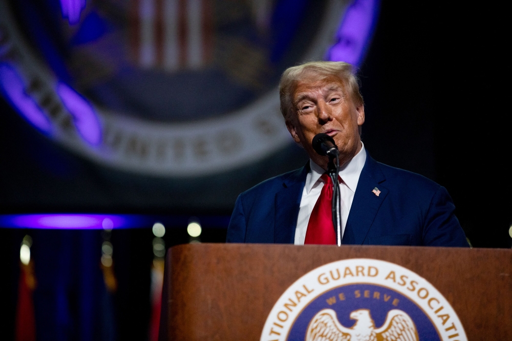 Republican presidential nominee, former US President Donald Trump speaks during the National Guard Association of the United States' 146th General Conference & Exhibition at Huntington Place Convention Center in Detroit, Michigan, on August 26, 2024. (Photo by Emily Elconin/Getty Images via AFP)

