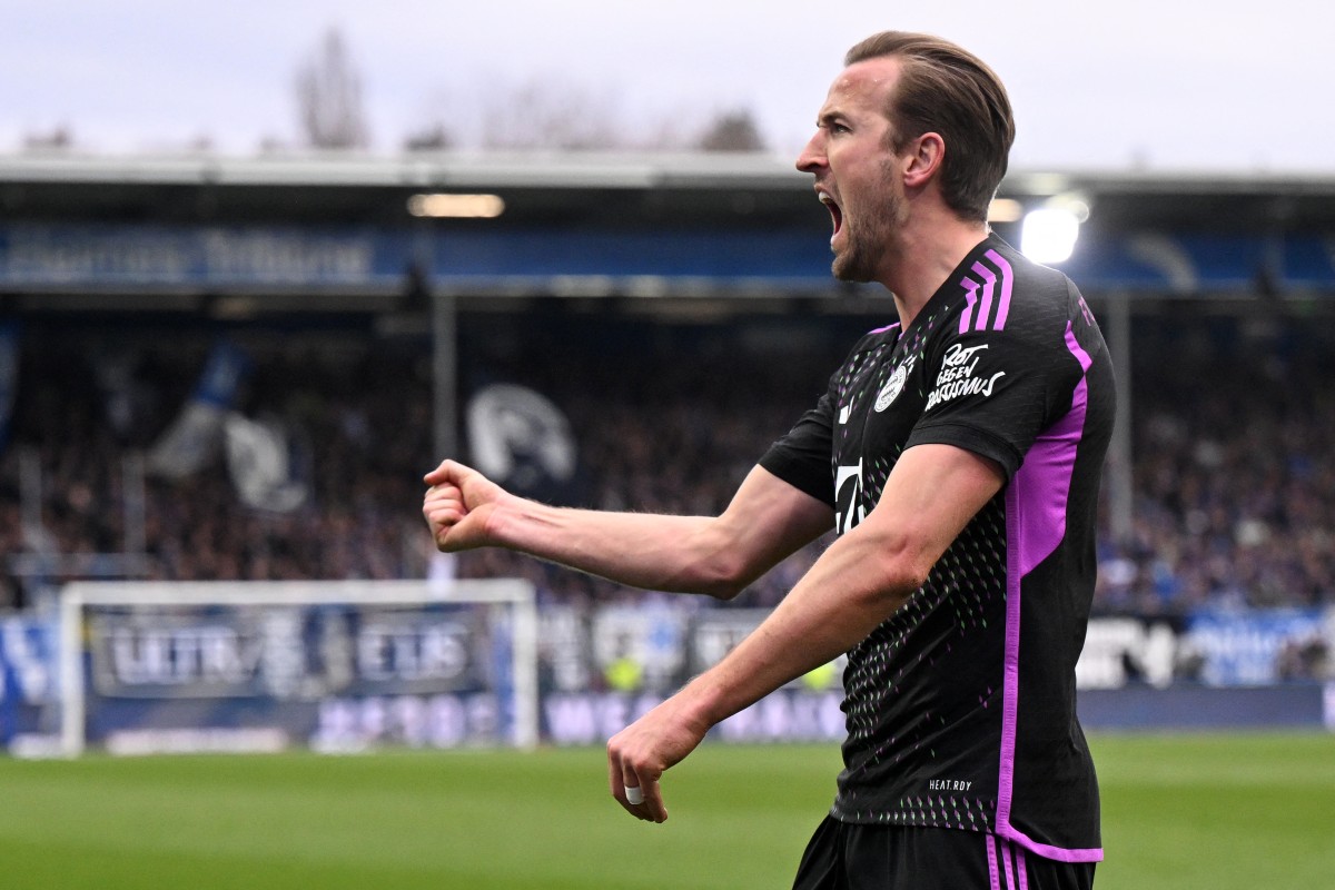 Bayern Munich's English forward #09 Harry Kane celebrates scoring during the German first division Bundesliga football match between SV Darmstadt 98 and FC Bayern Munich in Darmstadt, western Germany on March 16, 2024. (Photo by Kirill KUDRYAVTSEV / AFP)

