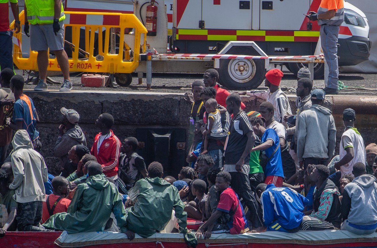 Photo used for demonstration purposes. African migrant people, part of a group of 386 migrants onboard of two boats, arrive onboard a 'cayuco' boat at La Restinga port on the Canary island of El Hierro on August 28, 2024.