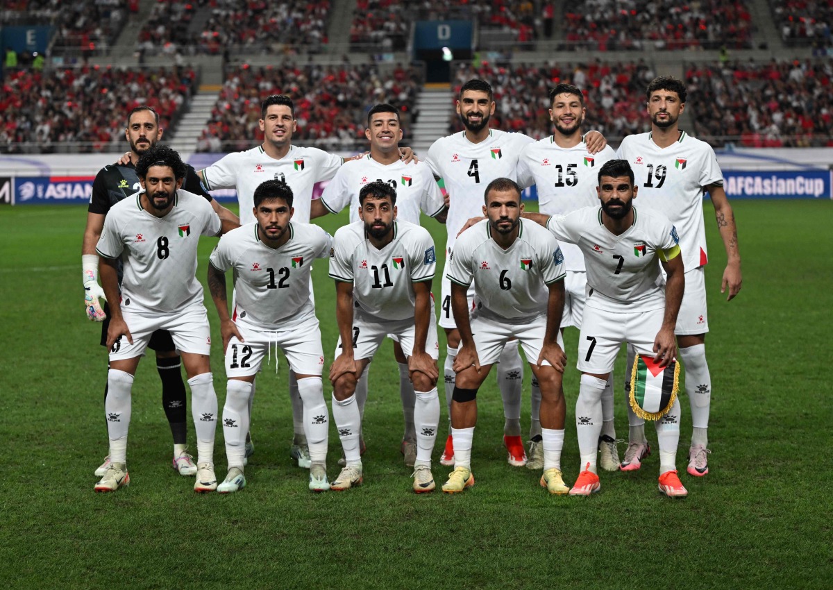 Palestine's players pose for a team photo during the FIFA World Cup 2026 Asia zone qualifiers football match between South Korea and Palestine in Seoul on September 5, 2024. (Photo by Jung Yeon-je / AFP)
