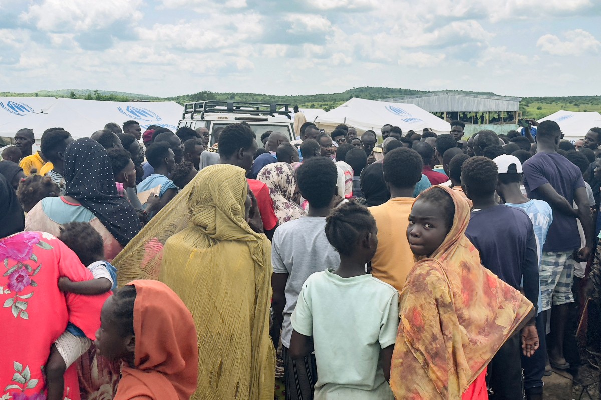Displaced Sudanese who have returned from Ethiopia gather in a camp run by the United Nations Refugee Agency (UNHCR) in Sudan's border town of Gallabat on September 4, 2024. Photo by AFP.