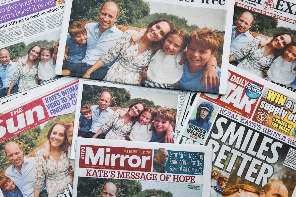 A photograph taken on September 10, 2024 shows the front pages of some of Britain's national newspapers, dominated by stories about Britain's Catherine, Princess of Wales following her announcement of having completed her course of chemotherapy following a shock cancer diagnosis earlier this year. Photo by BENJAMIN CREMEL / AFP