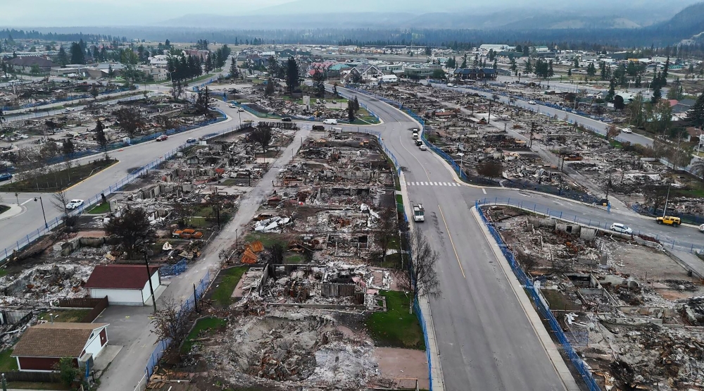 This handout videograb provided by Park Canada shows the devastated town of Jasper, Alberta, following a wildfire on August 15, 2024. (Photo by Handout / Park Canada / AFP) 