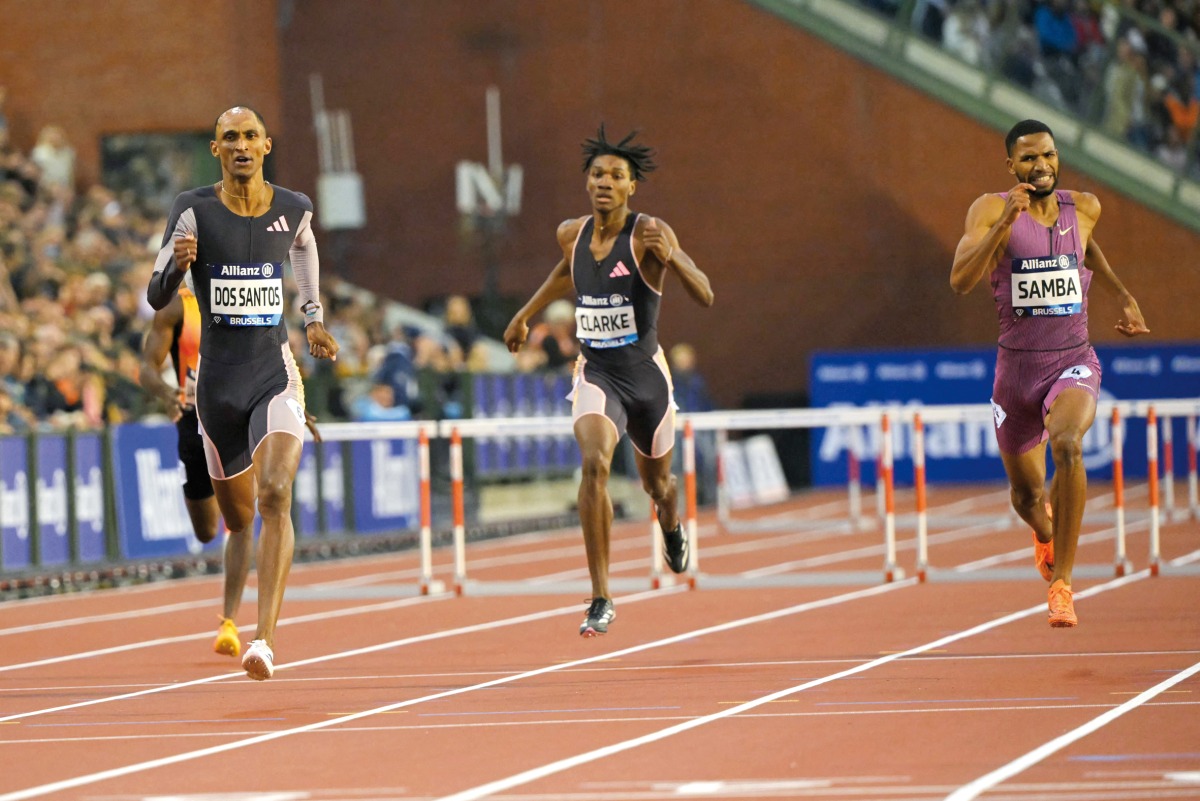 Qatar's Abderrahman Samba (right) finished second behind the  race winner Alison dos Santos of Brazil in the men's 400m hurdles event at the Brussels Diamond League Finals yesterday. AFP