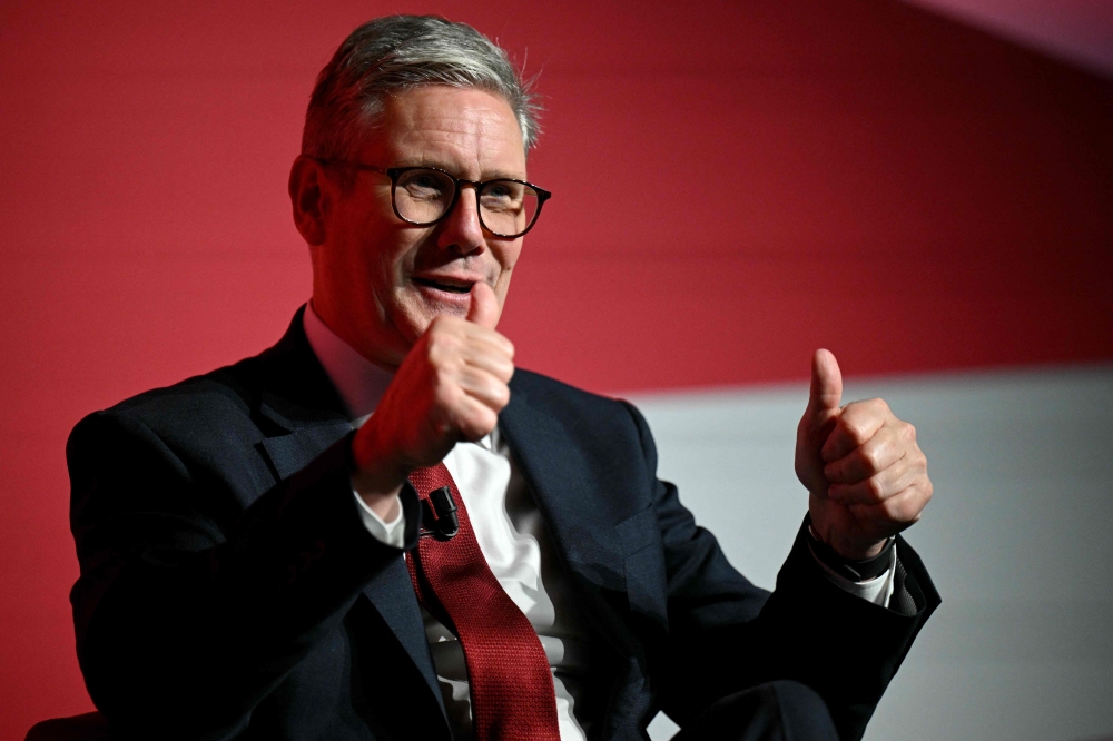 Britain's Prime Minister Keir Starmer reacts on the second day of the annual Labour Party conference in Liverpool, north-west England, on September 23, 2024. (Photo by Oli Scarff / AFP)