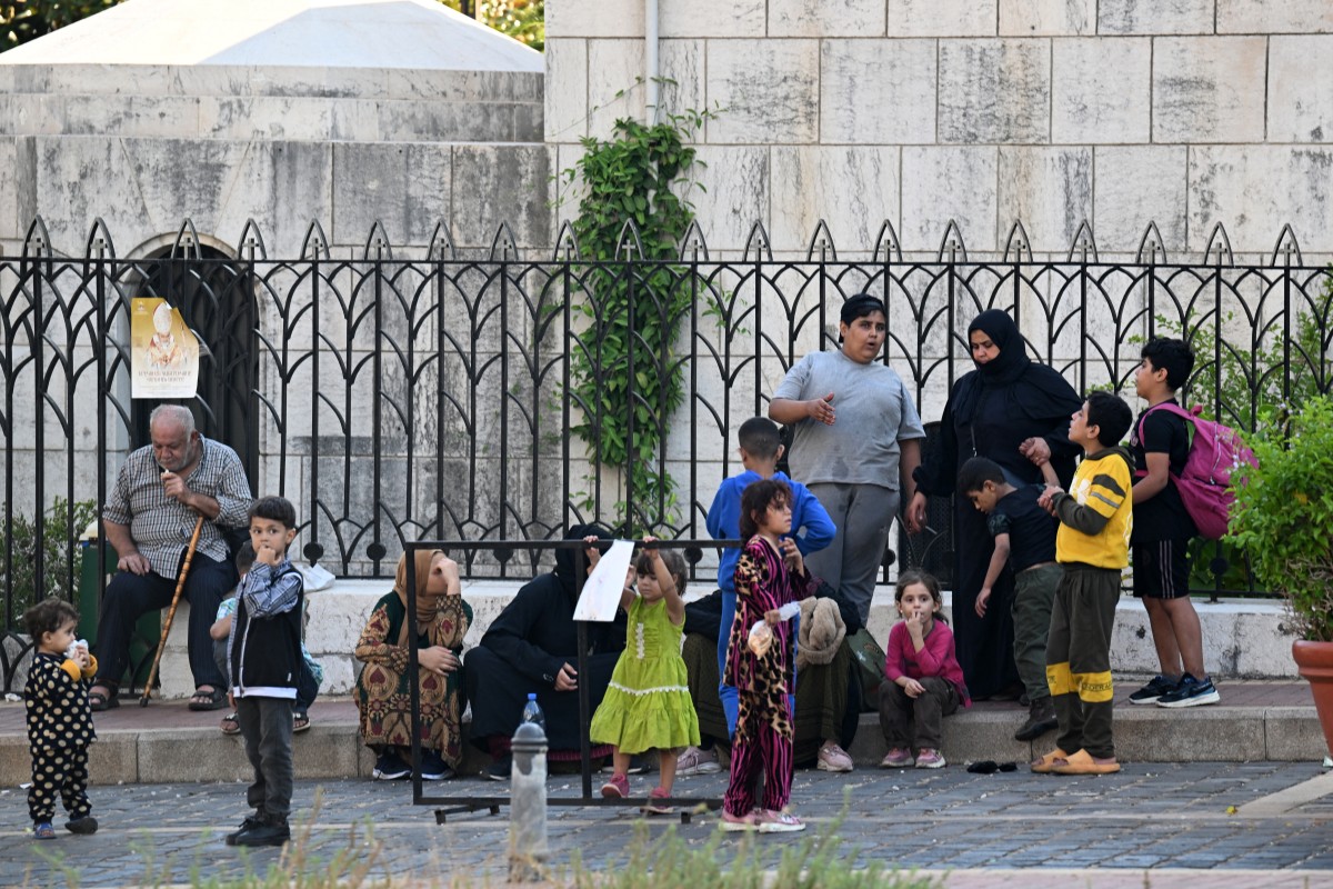 Photo used for demonstration purposes. People who fled Israeli bombardment on Beirut's southern suburbs, gather in front of a church the Lebanese capital's downtown district where they spent the night, on September 28, 2024. Photo by JOSEPH EID / AFP.
