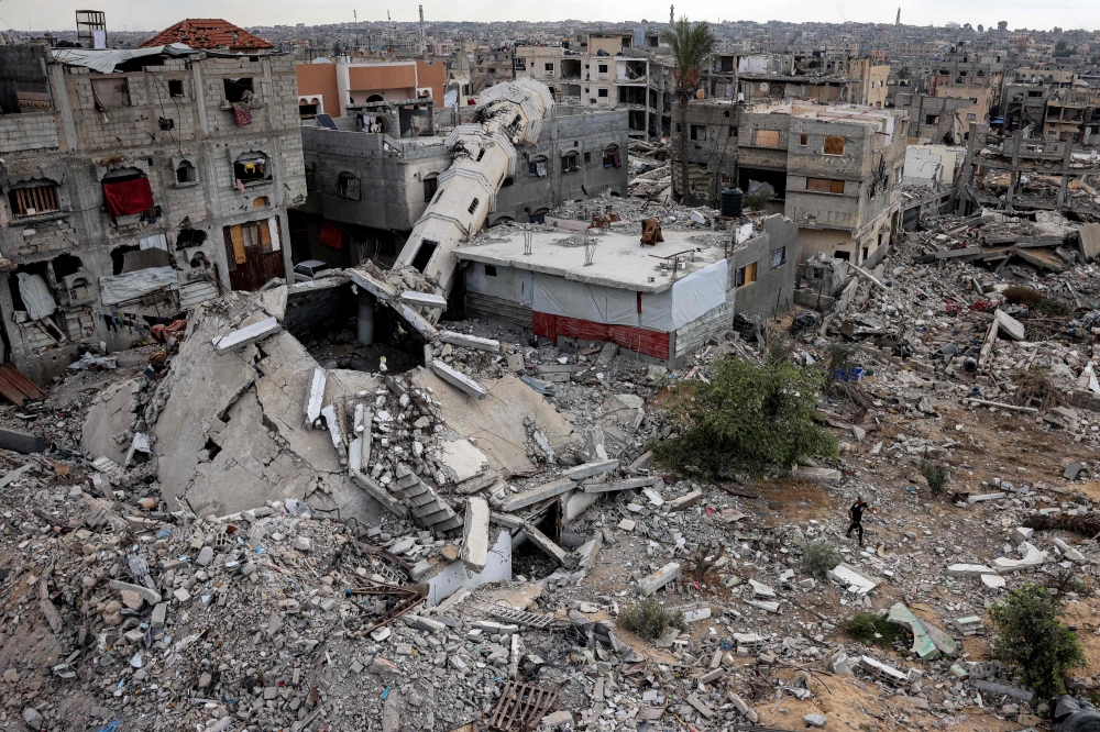 This overview shows a destroyed mosque and other buildings in Khan Yunis in the southern Gaza Strip on October 7, 2024. (Photo by Bashar Taleb / AFP)
