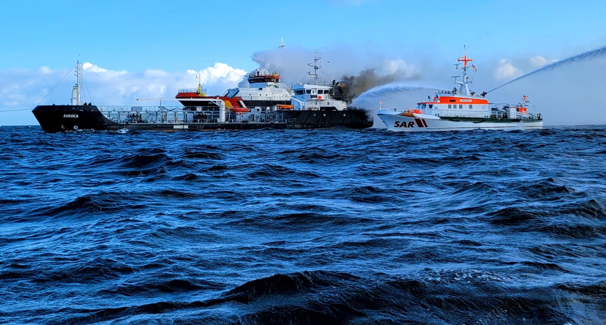 This handout photo taken and released on October 11, 2024 by the DGzRS (Deutsche Gesellschaft zur Rettung Schiffbruechiger = German Maritime Search and Rescue Service) shows smoke billowing from the German-flagged tanker ship 