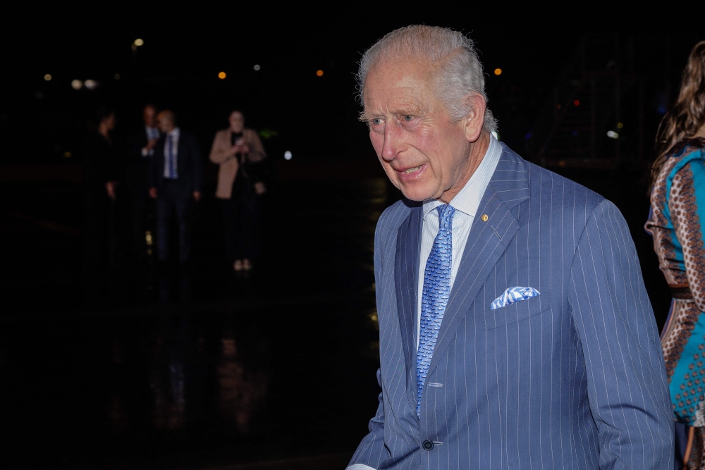 Britain's King Charles III arrives at Sydney International Airport in Sydney on October 18, 2024, for a six-day royal visit with Queen Camilla to Sydney and Canberra. (Photo by Brook Mitchell / POOL / AFP)