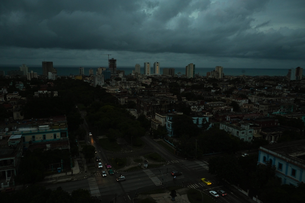 A general view of the city during a nationwide blackout caused by a grid failure in Havana, taken on October 18, 2024. (Photo by Yamil Lage / AFP)