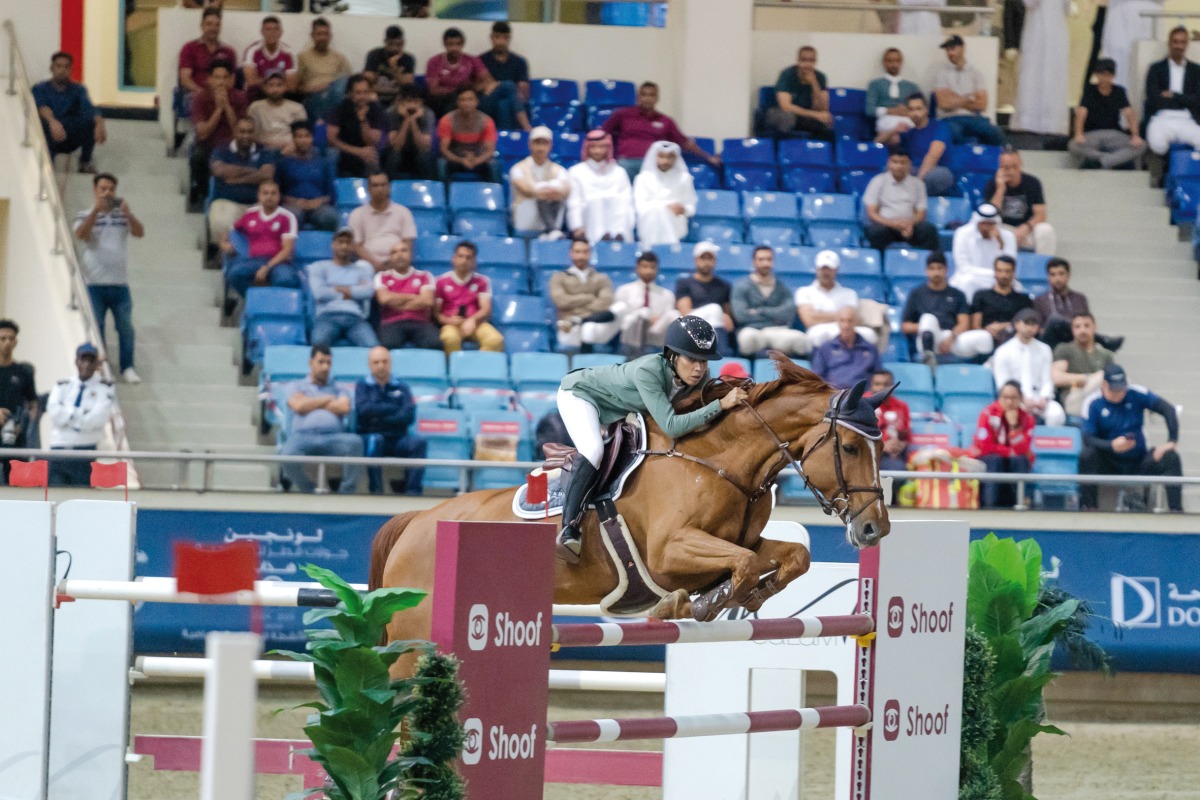 Cyrine Cherif guides Van Gallettana Z over a fence.