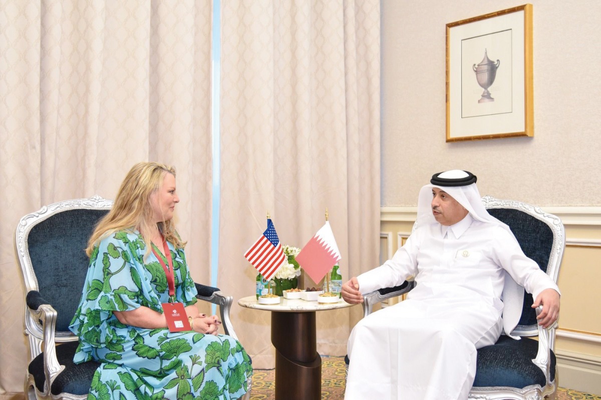 Attorney-General H E Dr. Issa bin Saad Al Jafali Al Nuaimi meeting a delegate. 