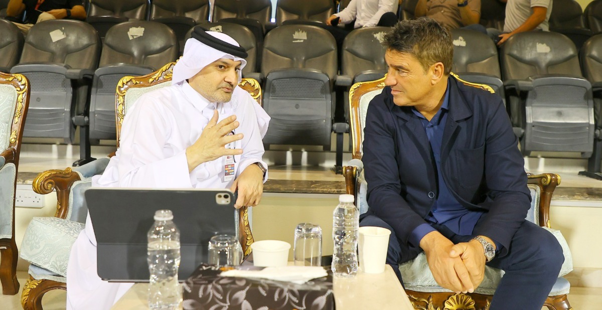 QFA Referees Committee President Hani Taleb Ballan with FIFA Director of Refereeing Massimo Busacca.