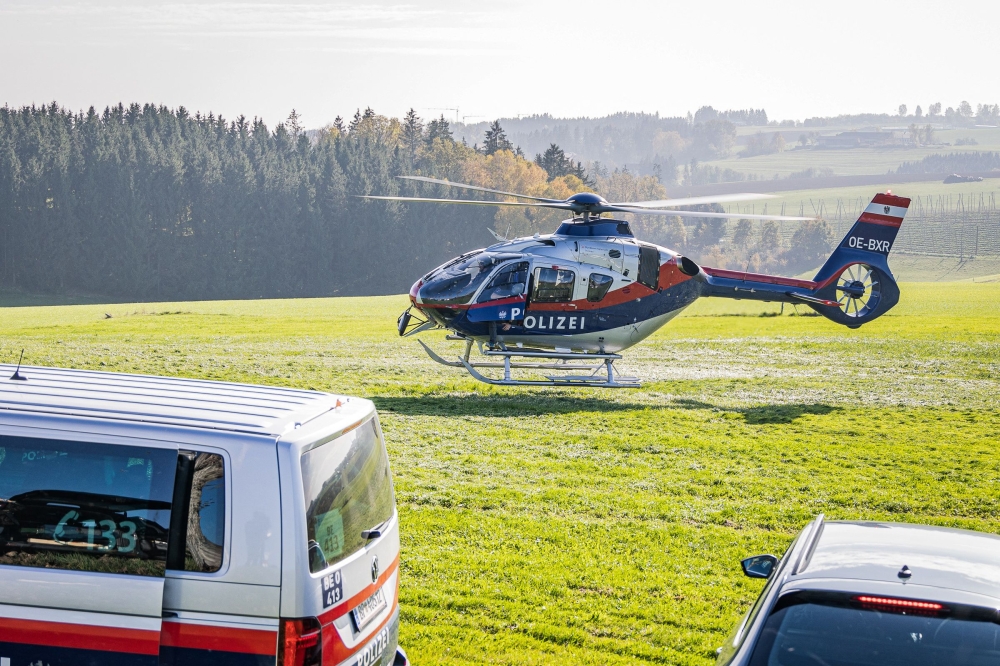 A police helicopter is pictured near Rohrbach, Upper Austria, on October 28, 2024, after at least one person was shot dead in the Muehlviertel region in the morning, according to Austrian media reports. Photo by Daniel BAYER / various sources / AFP