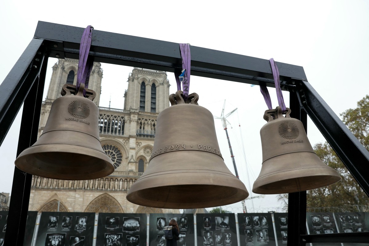 This photograph shows three new bells, including the bell used during the Paris Olympic Games, set to be placed into Paris' Notre-Dame cathedral on November 7, 2024, one month before it is due to reopen and five years after a devastating fire. Photo by Thomas SAMSON / AFP