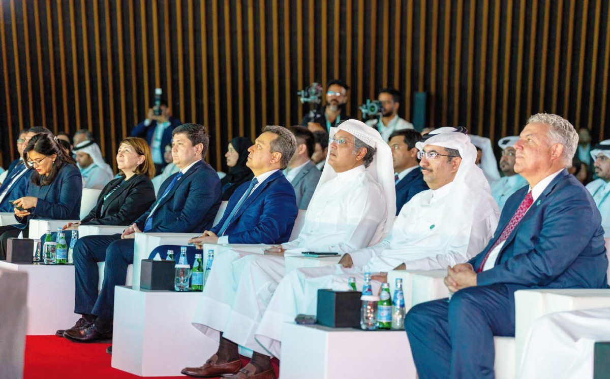 Minister of Communications and Information Technology H E Mohammed bin Ali Al Mannai (third right) with other officials during the event.
