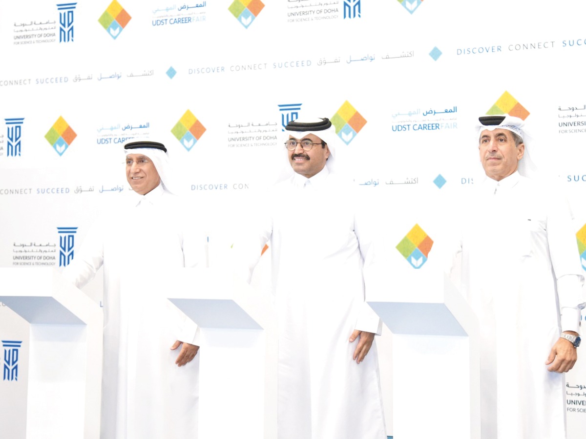 Chairman of UDST’s Board of Trustees, H E Dr. Mohammed bin Saleh Al Sada (centre); MoEHE Undersecretary Dr. Ibrahim bin Saleh Al Naimi (right); and UDST President Dr. Salem Al Naemi (left) inaugurating the career fair.