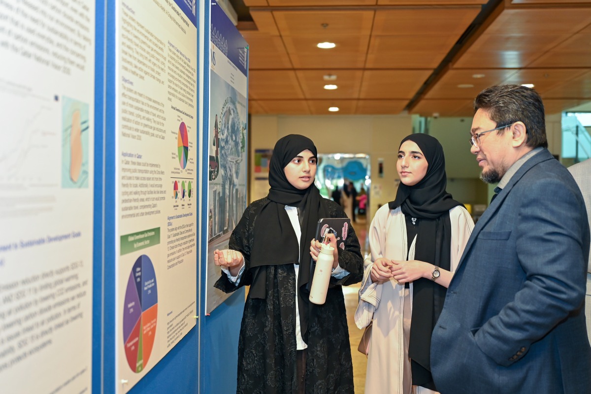 Participants listen to an explanation during the event.