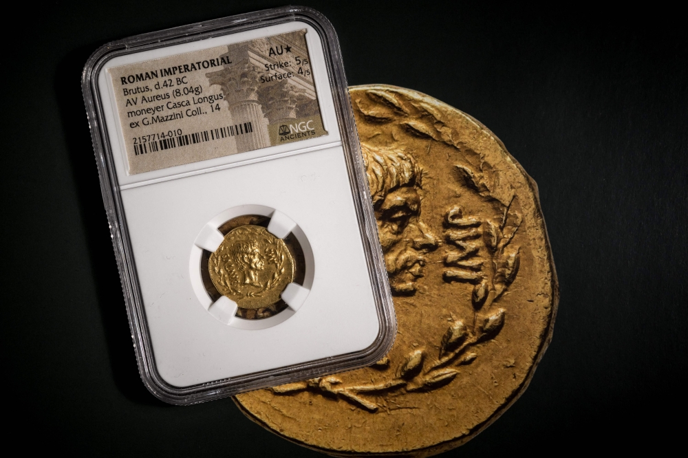 File: A rare Roman gold coin bearing the image of Brutus, the famed assassin of Julius Caesar is diplayed at the Numismatica Genevensis (NGSA) auction house in Geneva on December 4, 2024. (Photo by Fabrice Coffrini / AFP)