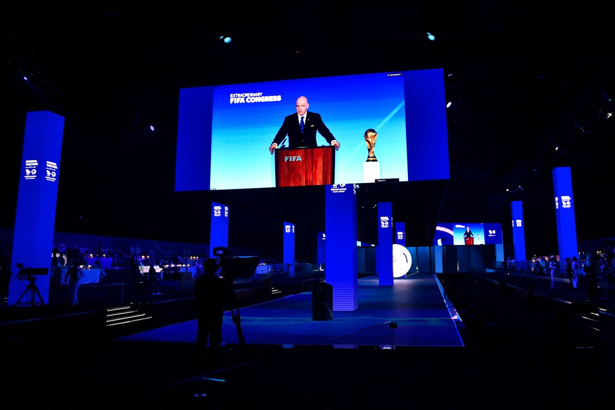 A speech by President of FIFA Gianni Infantino is broadcasted on a screen during a ceremony in the capital Riyadh on December 11, 2024, as the FIFA Congress votes for the hosting rights for the 2034 World Cup with Saudi Arabia being the sole candidate. (Photo by AFP)
 