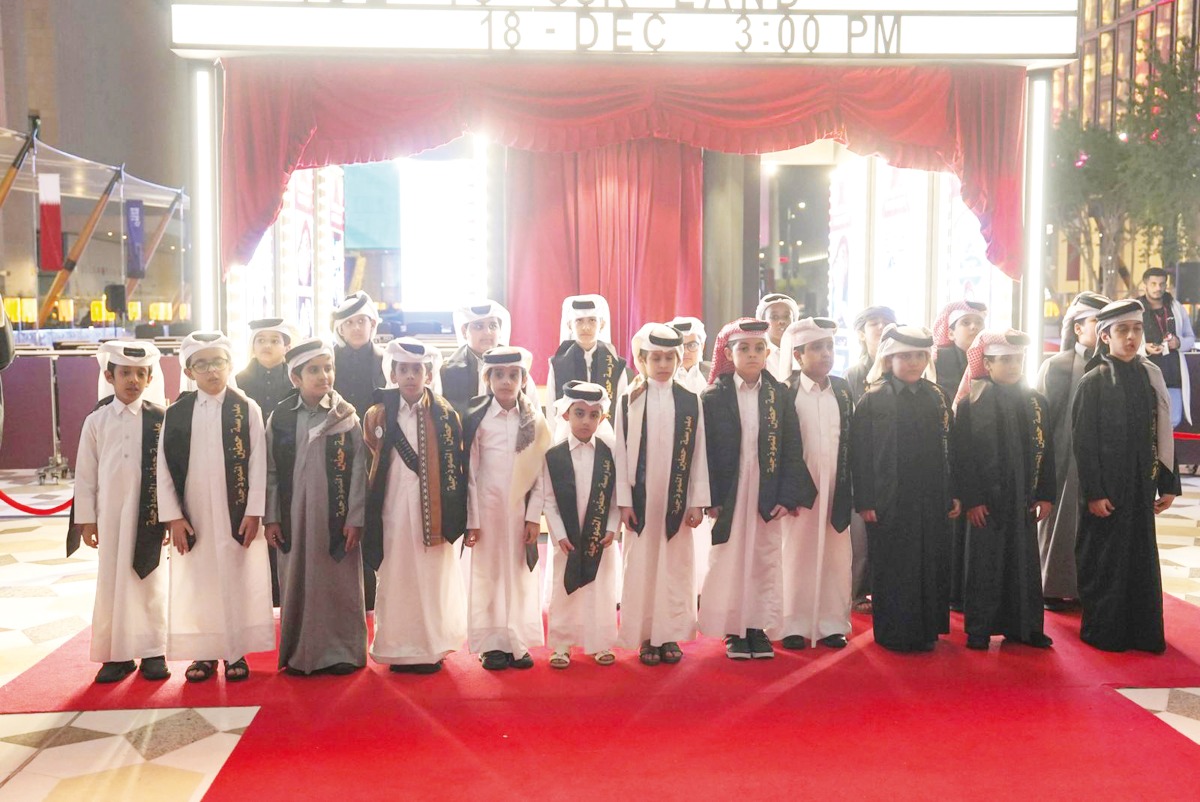 Children participate in the programme to mark Qatar National Day. 