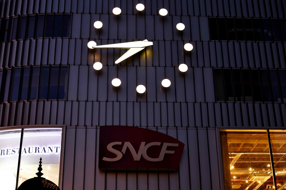 (Files) This picture shows the logo of the French national railway company SNCF in Paris on February 7, 2023. (Photo by Sameer Al-Doumy / AFP)
 